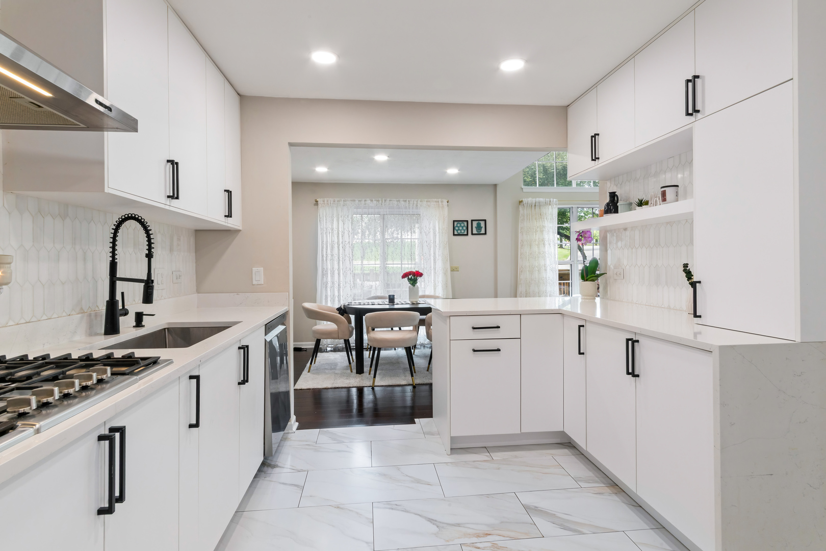 2140 Seaver Lane Hoffman Estates, IL 60169 - Photo 7 of 25 a kitchen with cabinets and window