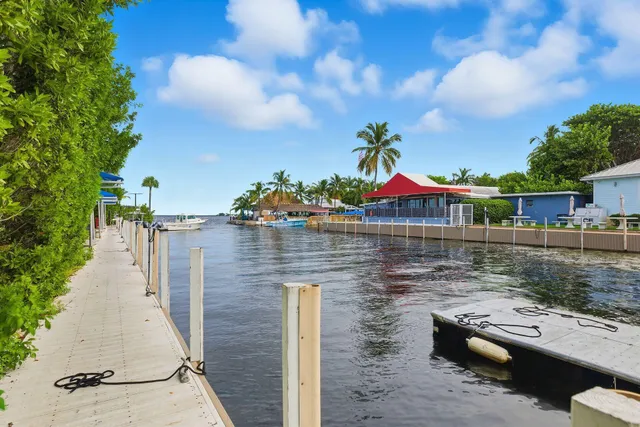 a view of swimming pool with sitting area