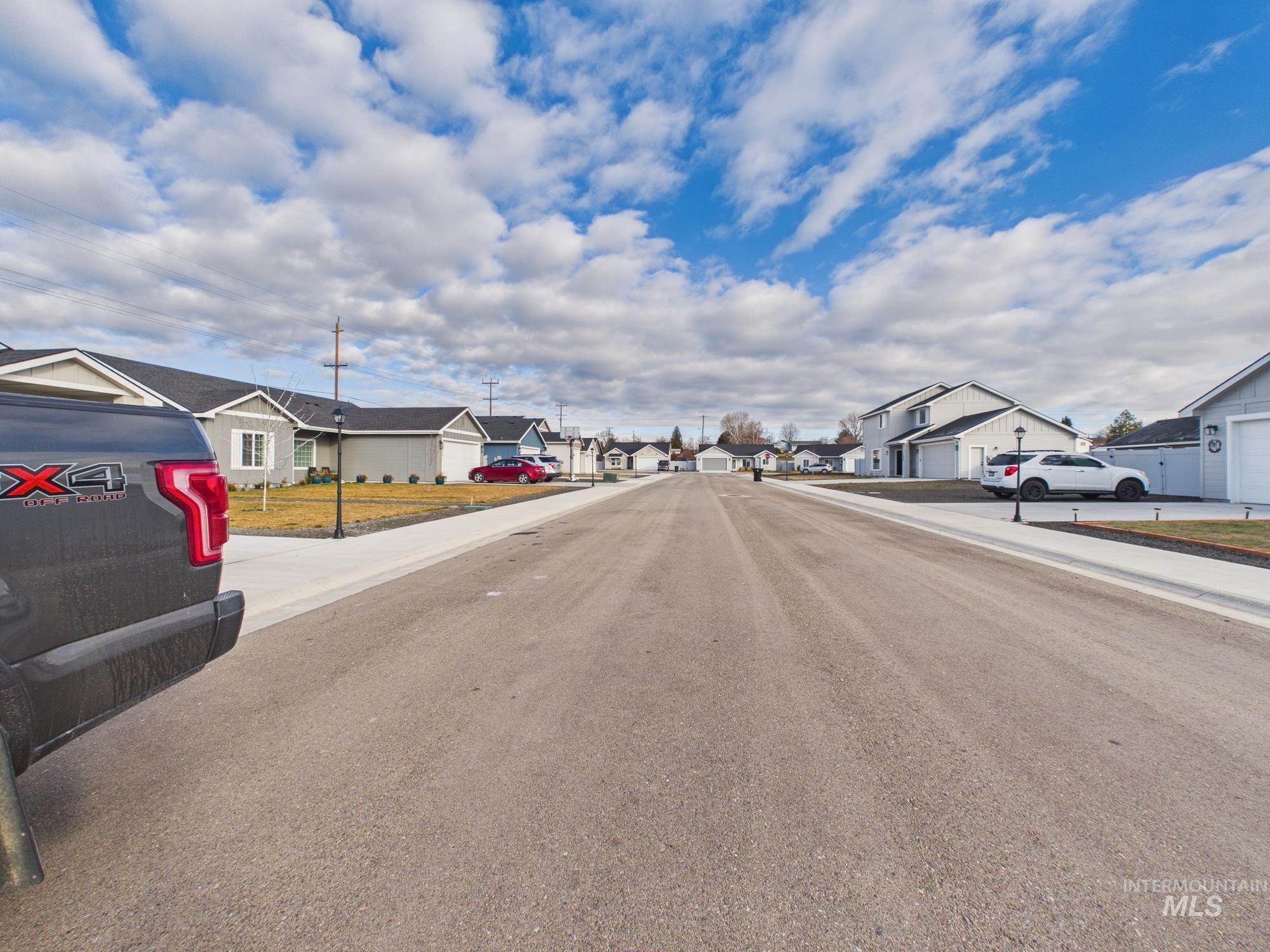 1545 Trail Way Weiser, ID 83672 - Photo 49 of 50 View of asphalt street featuring a residential view and sidewalks