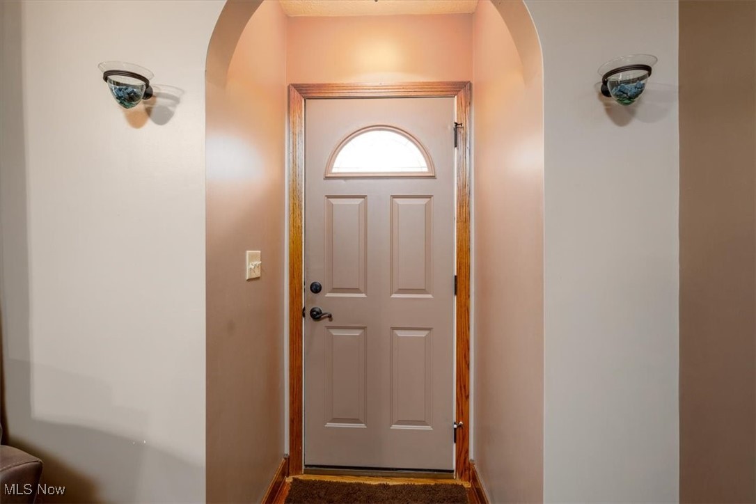 3831 Cook Road Rootstown, OH 44272 - Photo 8 of 25 Front door entry, featuring arched walkway