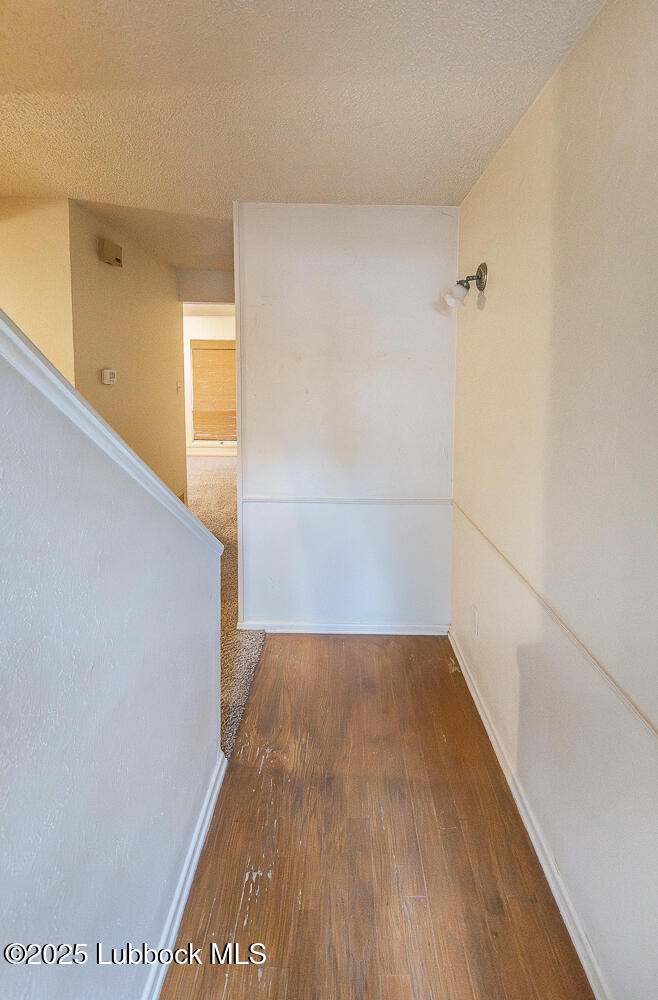 5750 38th Street Lubbock, TX 79407 - Photo 4 of 24 a view of a hallway