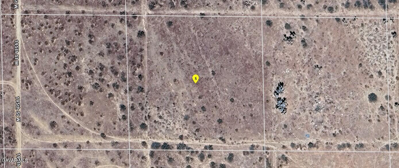 193rd W And Patterson Rd Road Rosamond, CA 93560 - Photo 6 of 7 a close view of a backyard