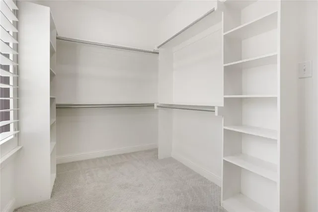 a view of an empty walk in closet