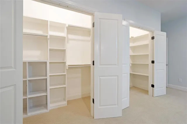 a view of an empty walk in closet