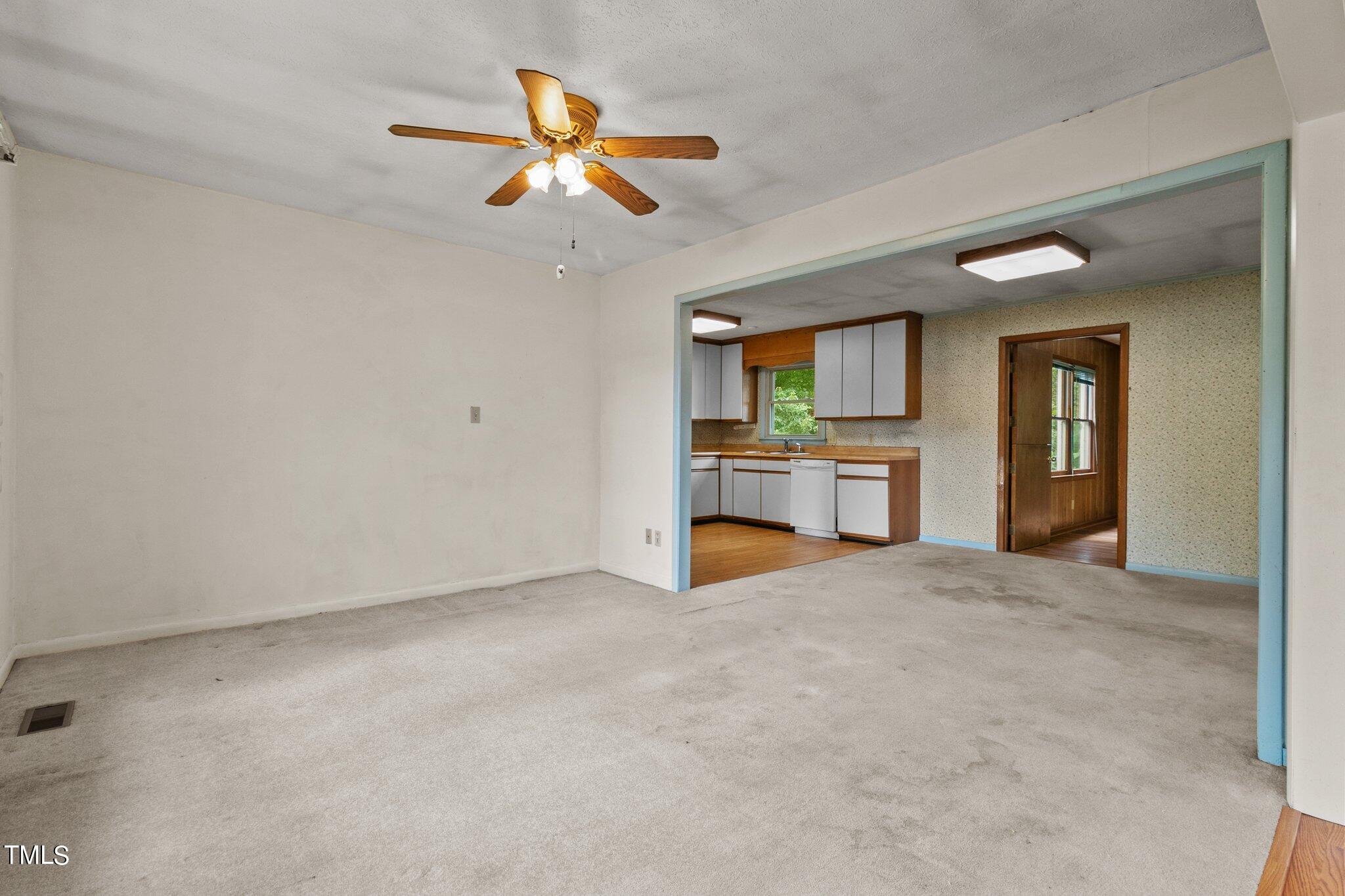 4998 Stewart Road Wade, NC 28395 - Photo 7 of 38 4998 Stewart living room and breakfast n
