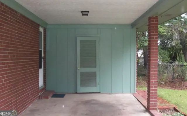a view of backyard with green space