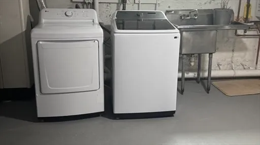 a utility room with dryer and washer