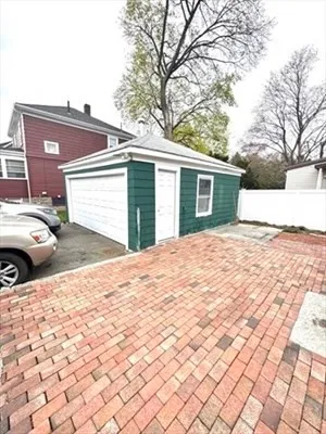 a backyard of a house with yard and trees