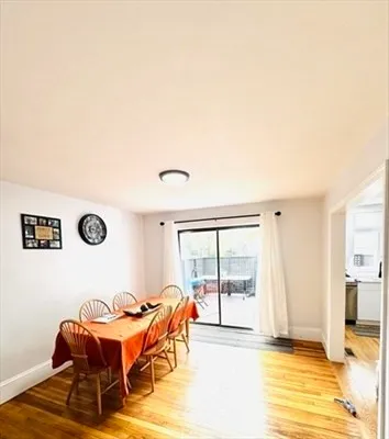 a view of a livingroom with furniture and windows