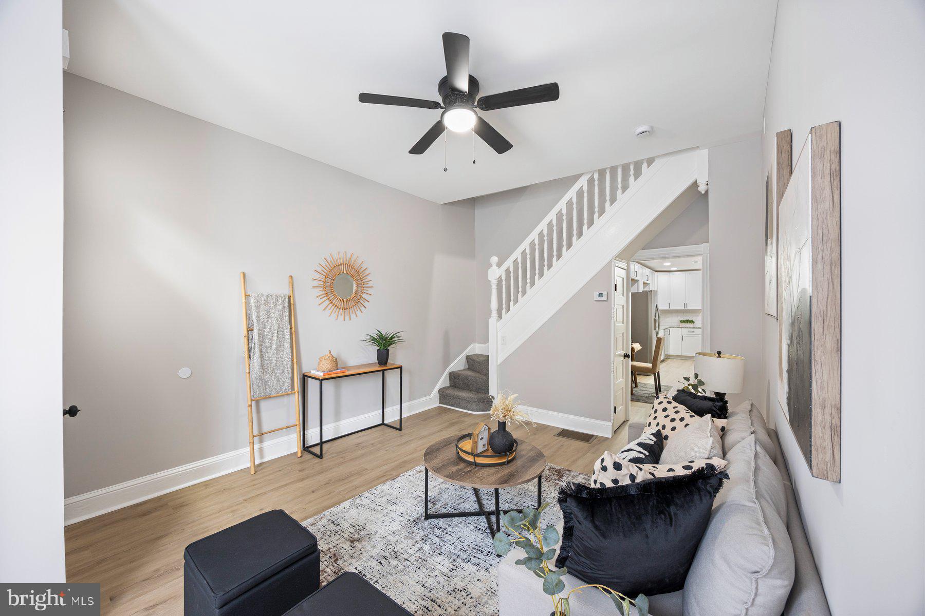 3611 Chestnut Avenue Baltimore, MD 21211 - Photo 18 of 38 a living room with furniture and a potted plant