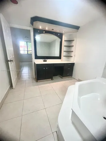 a living room with a couch and a flat screen tv