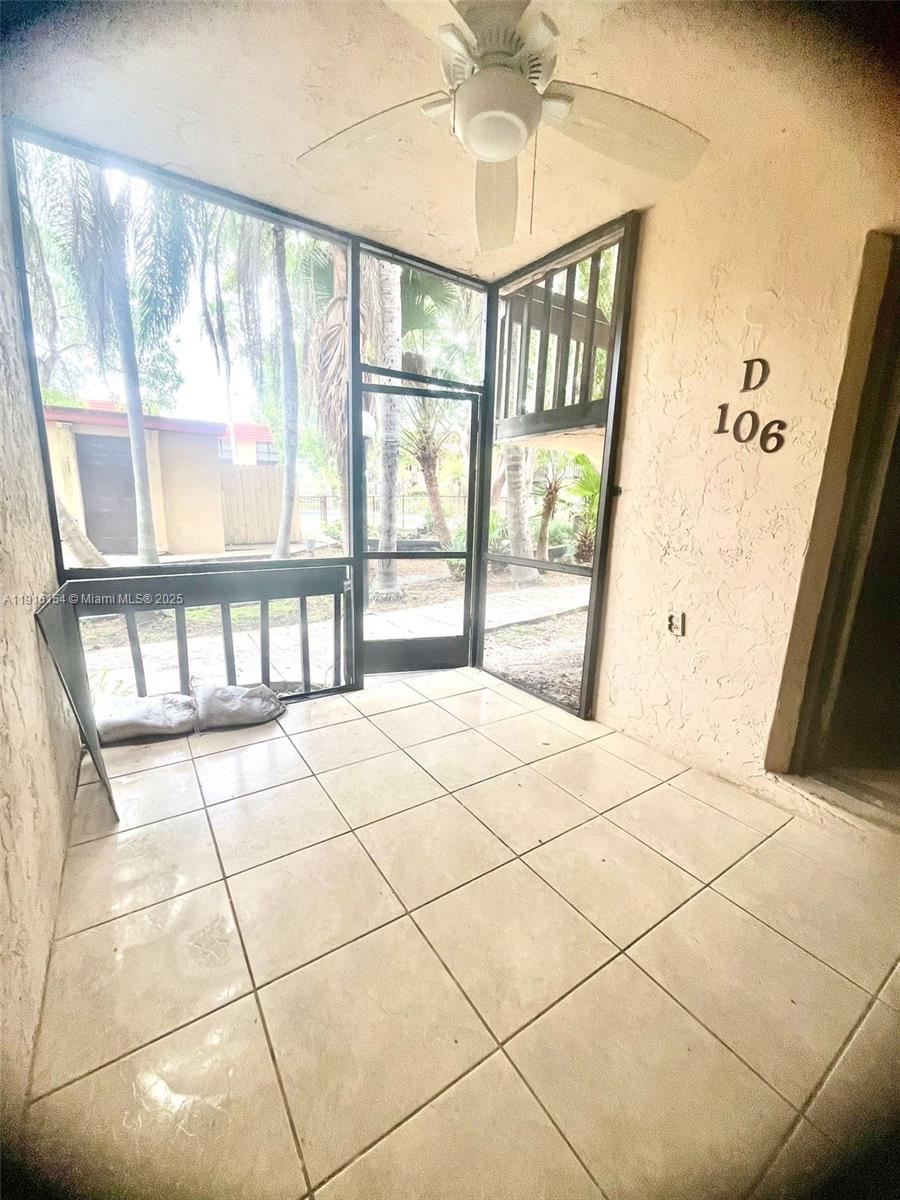 800 Northeast 199th Street, Unit 106D Miami, FL 33179 - Photo 19 of 20 a view of an empty room with a window