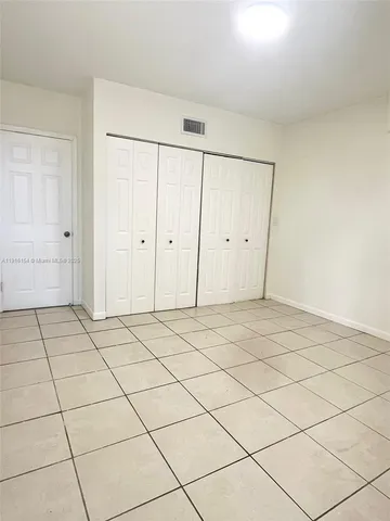 a view of a room & utility room