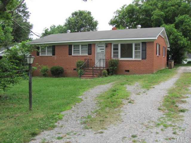 222 Forestville Road Wake Forest, NC 27587 - Photo 1 of 18 a front view of house with yard and green space