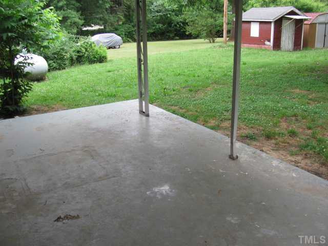 222 Forestville Road Wake Forest, NC 27587 - Photo 13 of 18 a view of a house with backyard