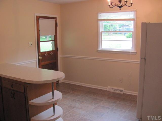 222 Forestville Road Wake Forest, NC 27587 - Photo 6 of 18 a room with a window