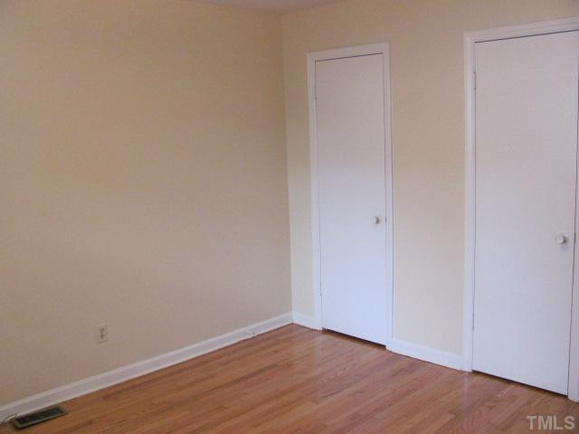 222 Forestville Road Wake Forest, NC 27587 - Photo 8 of 18 a view of an empty room
