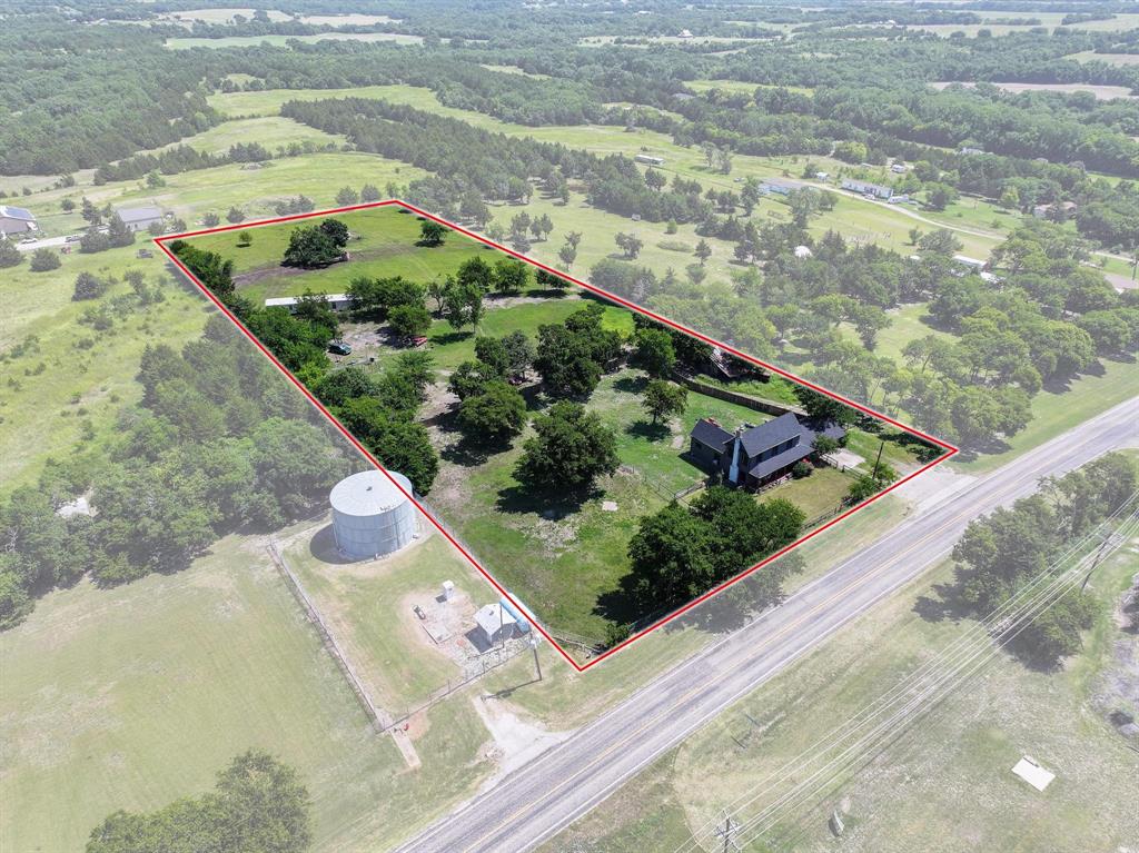 4453 Farm To Market 902 Howe, TX 75459 - Photo 19 of 40 Expansive rural property featuring a single-family residence, mature trees, and open land