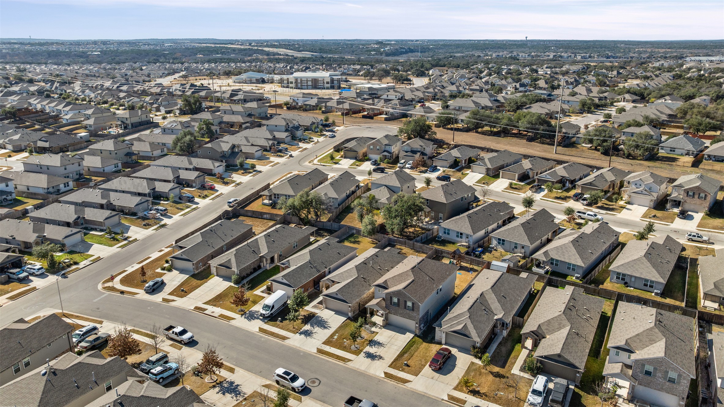 132 Dunlin Lane Leander, TX 78641 - Photo 32 of 34 Aerial view of property and surrounding area with nearby suburban area
