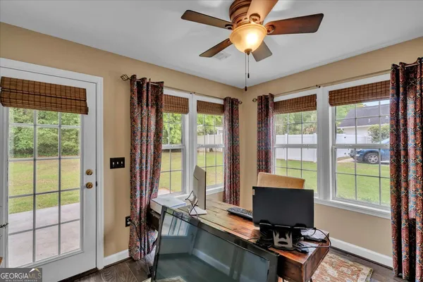 a kitchen with a stove a sink and a microwave
