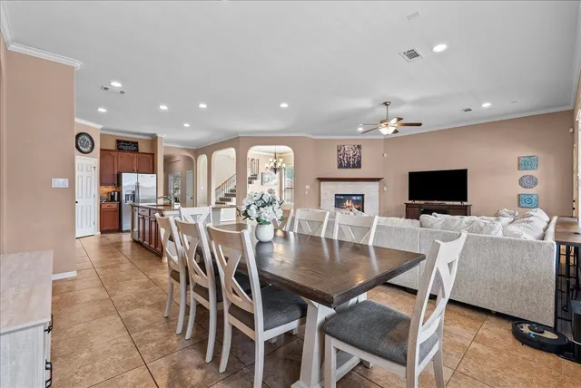 a large kitchen with stainless steel appliances lots of counter top space