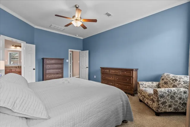 a view of storage and utility room with washer and dryer