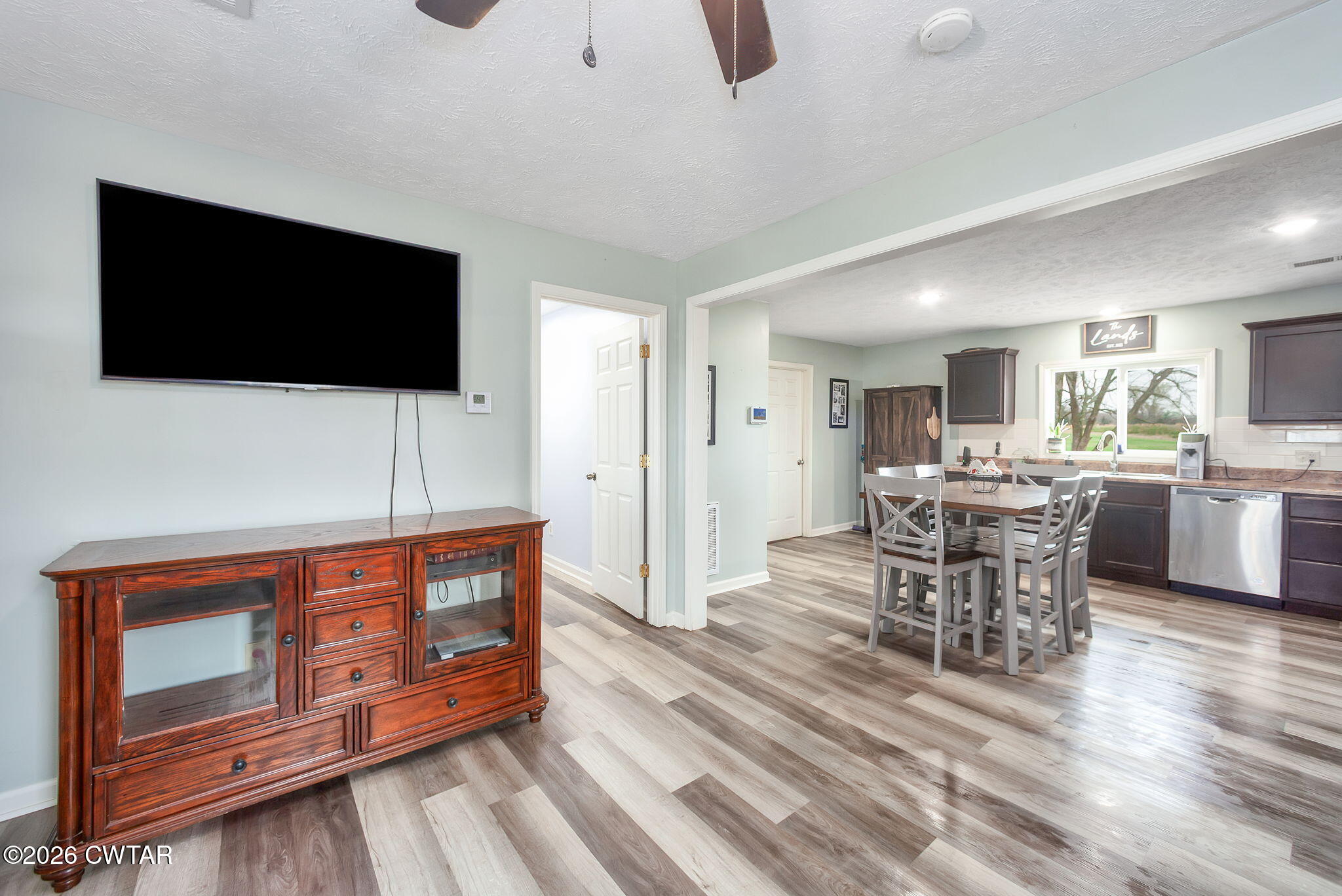 919 Bratt Thomas Road Brownsville, TN 38012 - Photo 19 of 29 a living room with furniture and a flat screen tv