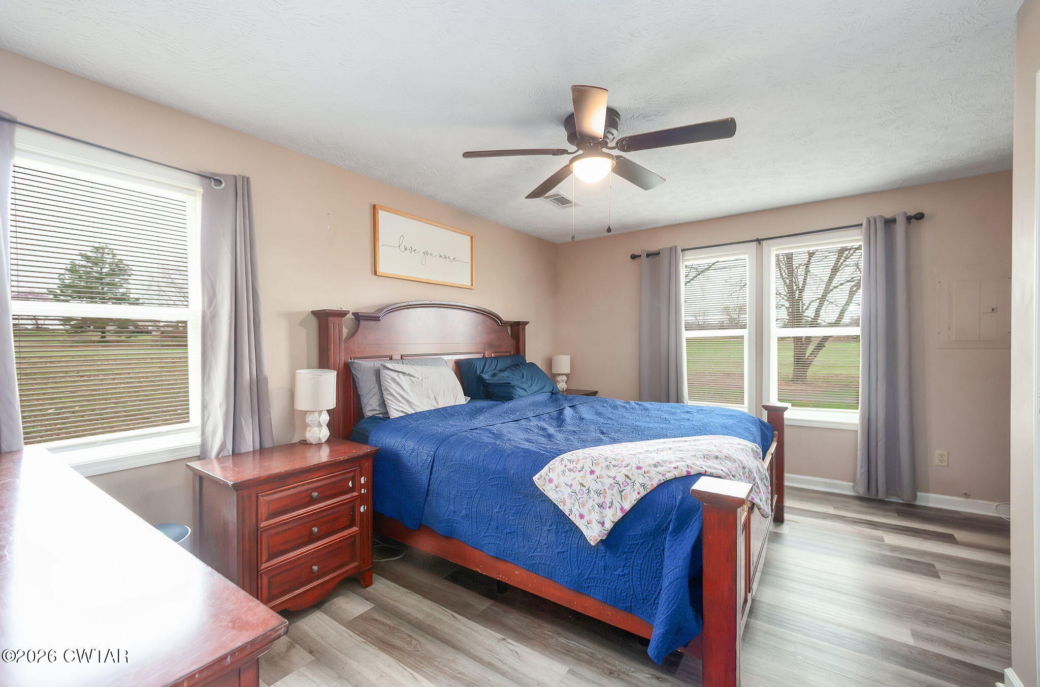 919 Bratt Thomas Road Brownsville, TN 38012 - Photo 22 of 29 a bedroom with a large bed and a window