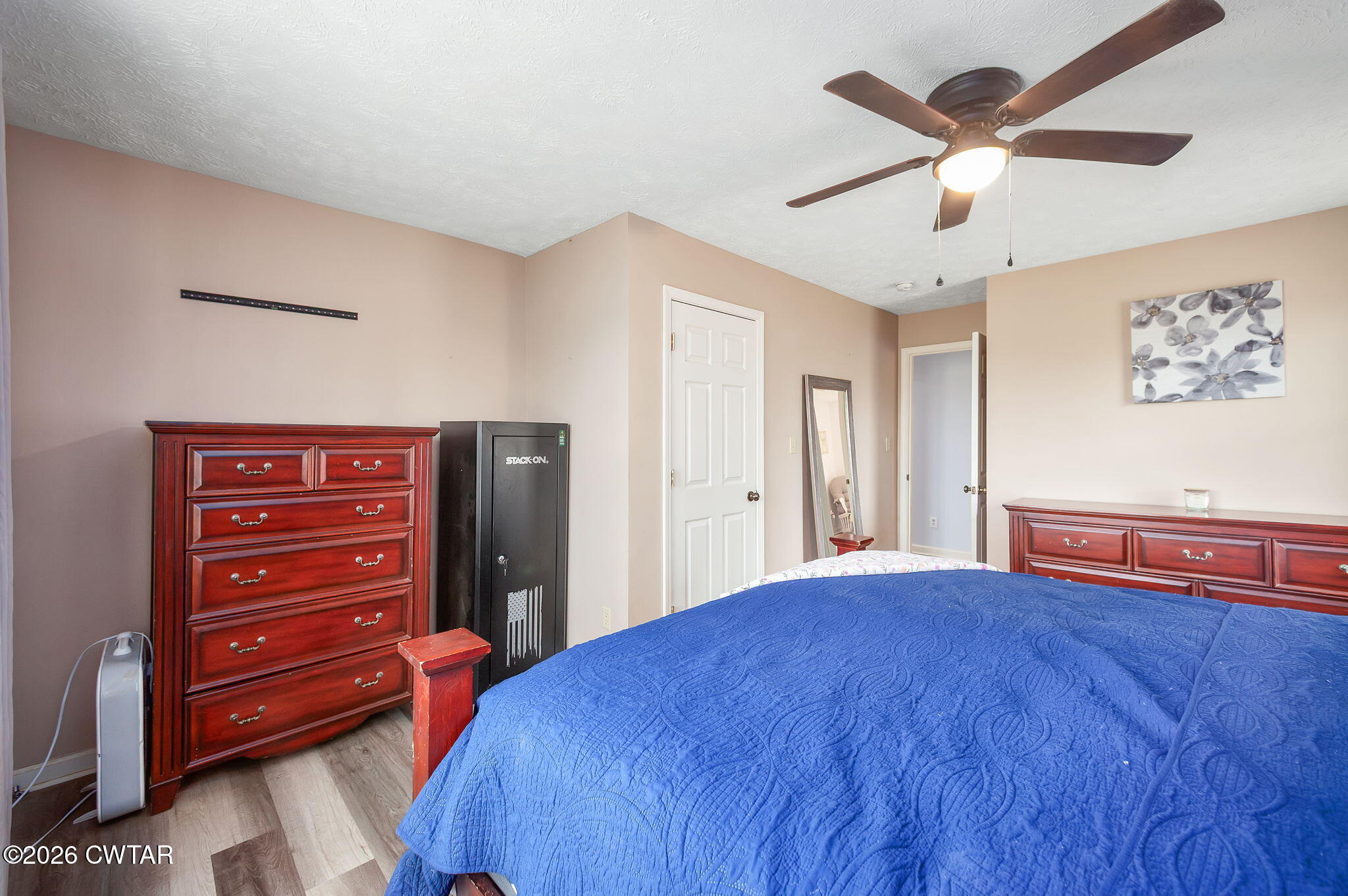 919 Bratt Thomas Road Brownsville, TN 38012 - Photo 23 of 29 a bedroom with a bed and a dresser