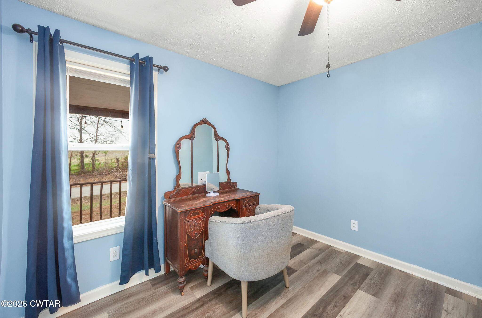 919 Bratt Thomas Road Brownsville, TN 38012 - Photo 27 of 29 a room with furniture and a window