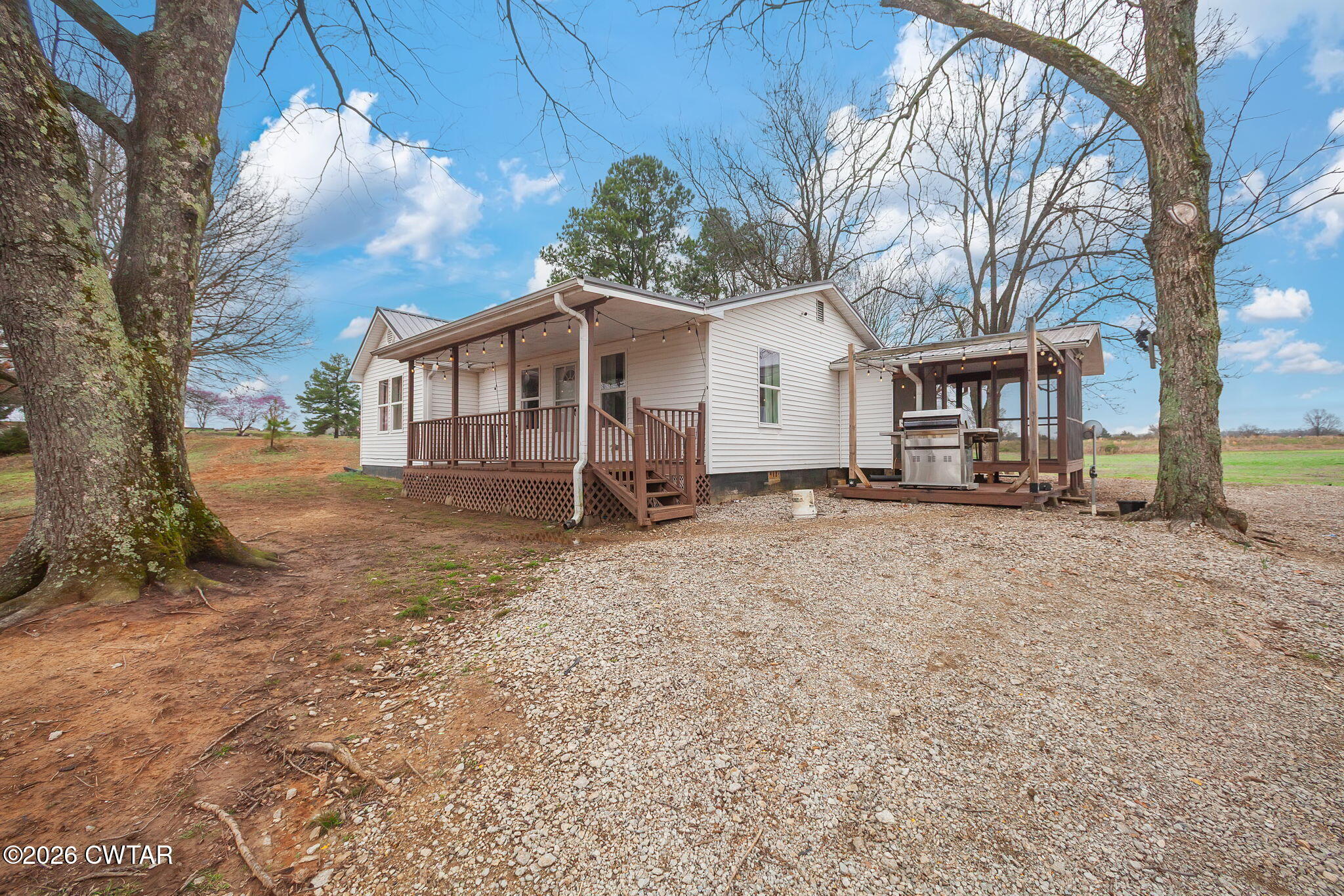 919 Bratt Thomas Road Brownsville, TN 38012 - Photo 4 of 29 a view of a house with a yard