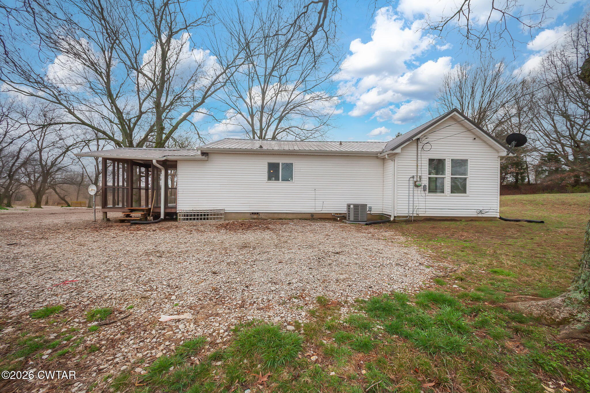 919 Bratt Thomas Road Brownsville, TN 38012 - Photo 5 of 29 a house view with a backyard space