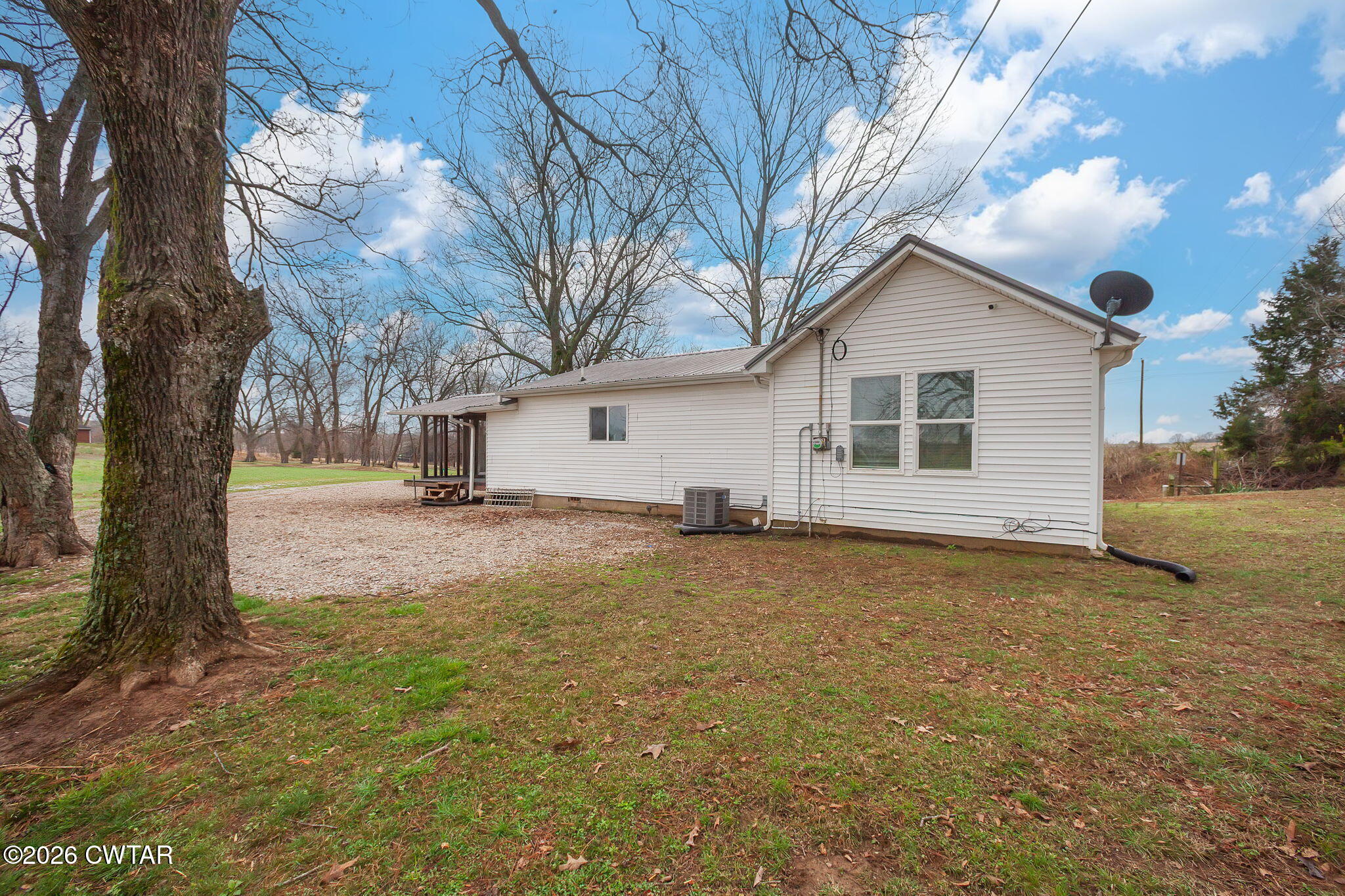 919 Bratt Thomas Road Brownsville, TN 38012 - Photo 7 of 29 a view of a house with a yard