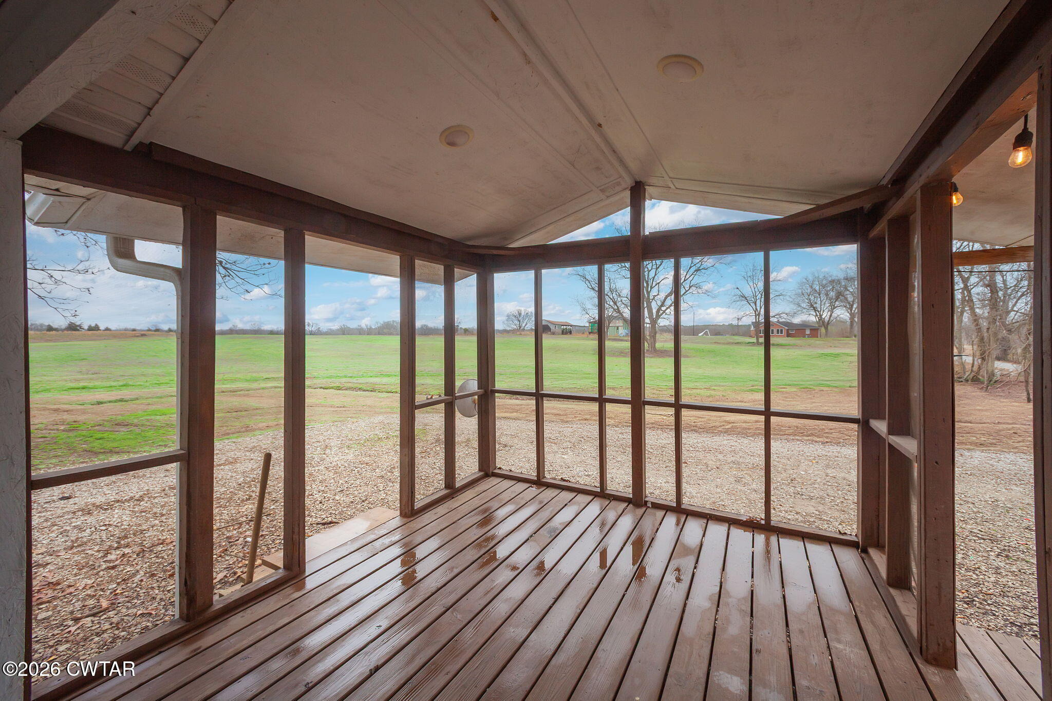 919 Bratt Thomas Road Brownsville, TN 38012 - Photo 10 of 29 a view of a room with wooden floor