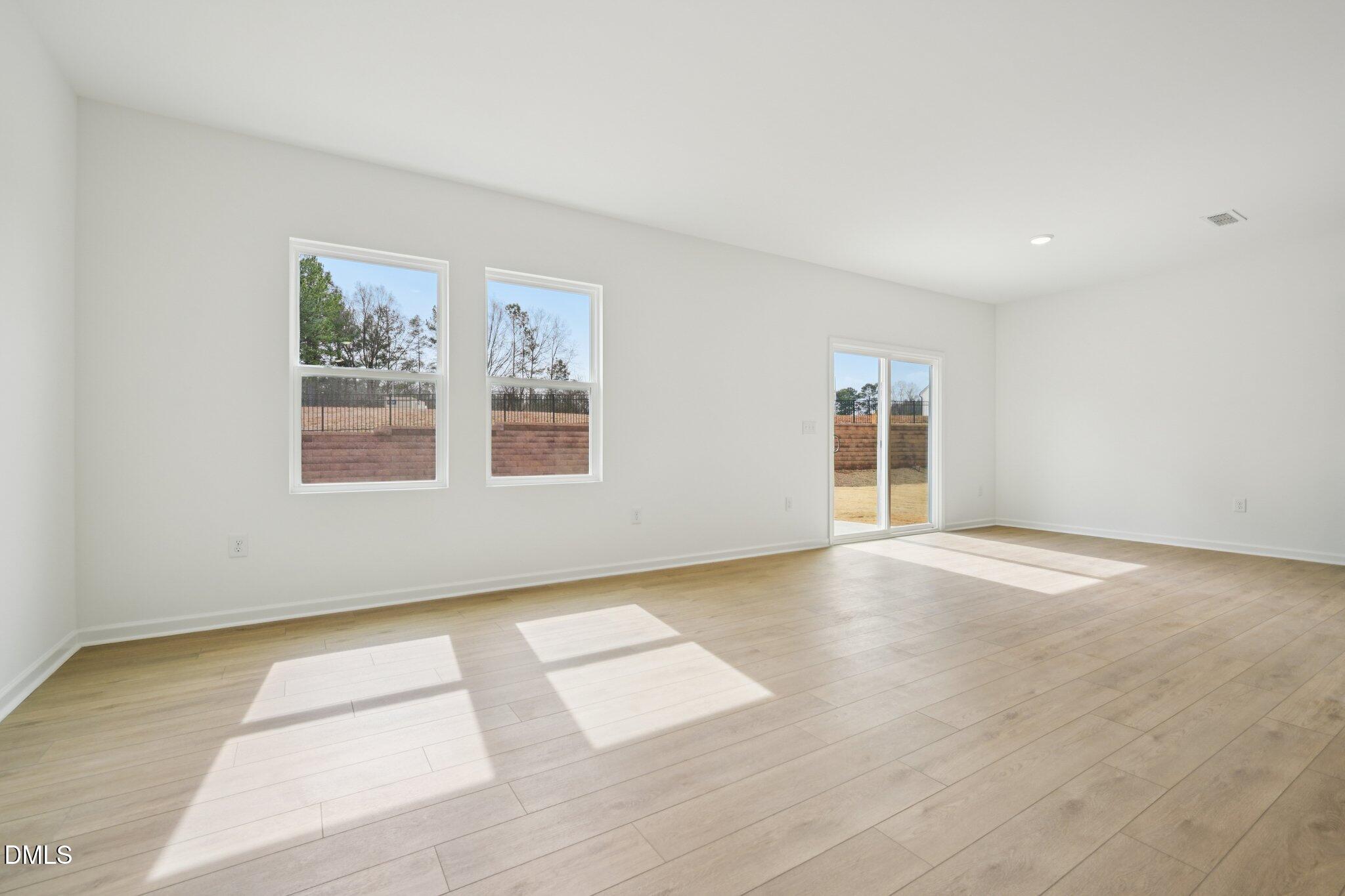 11793 Salers Loop Middlesex, NC 27557 - Photo 13 of 53 a view of an empty room with a window