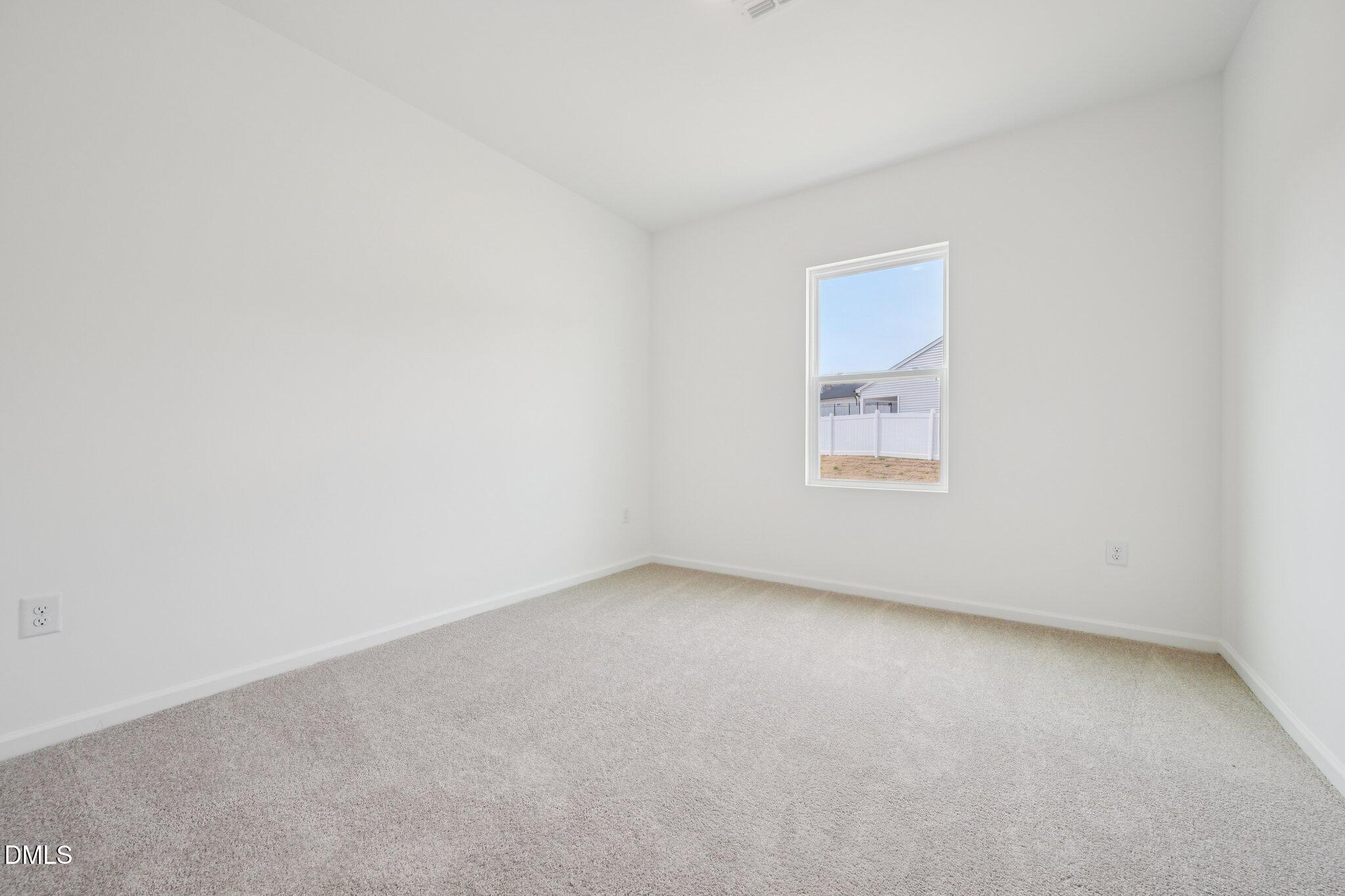 11793 Salers Loop Middlesex, NC 27557 - Photo 21 of 53 an empty room with a natural light