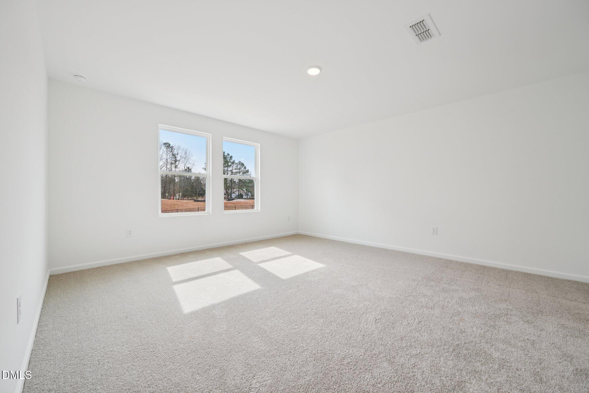 11793 Salers Loop Middlesex, NC 27557 - Photo 25 of 53 an empty room with windows