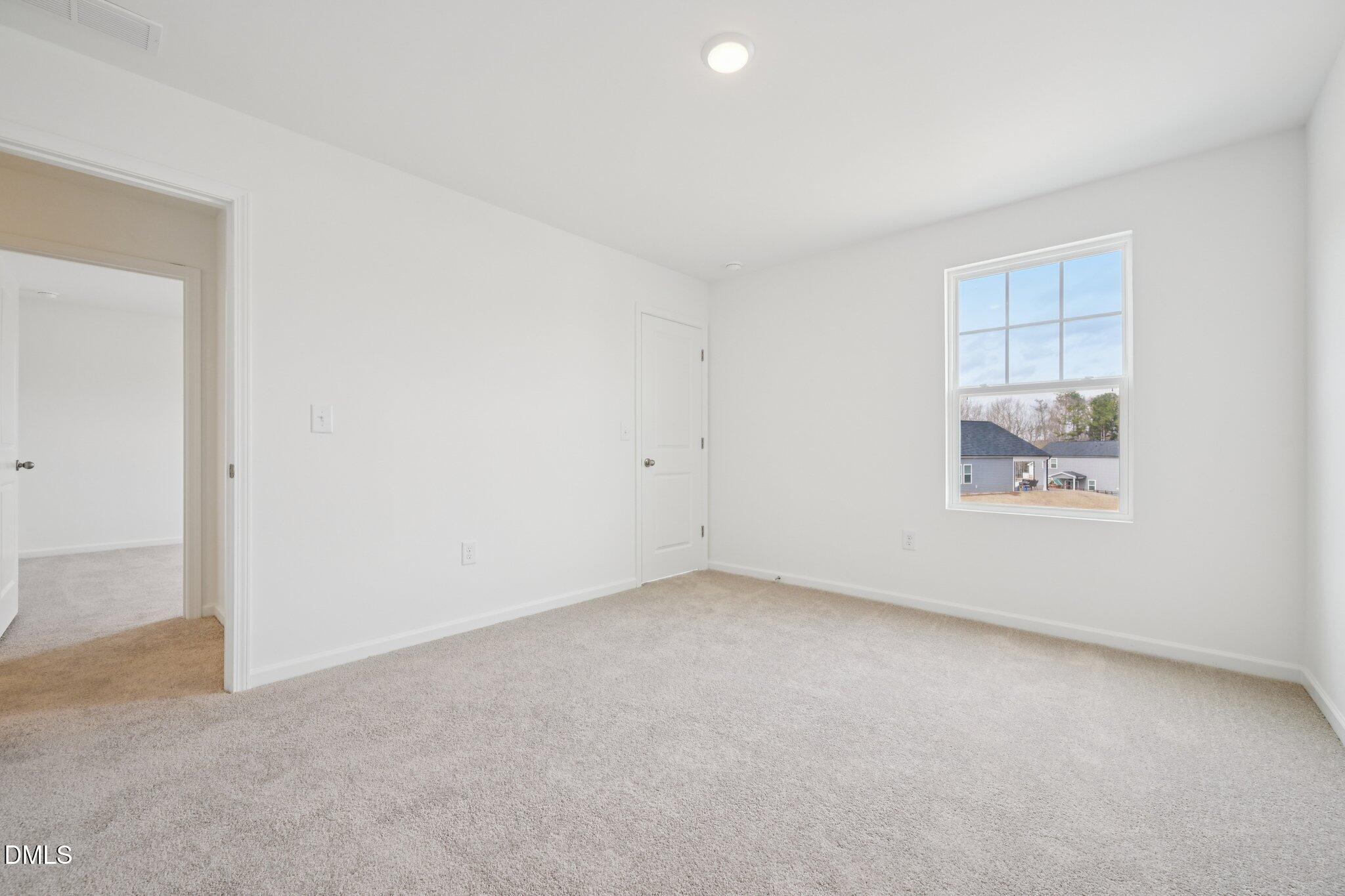 11793 Salers Loop Middlesex, NC 27557 - Photo 38 of 53 an empty room with a window