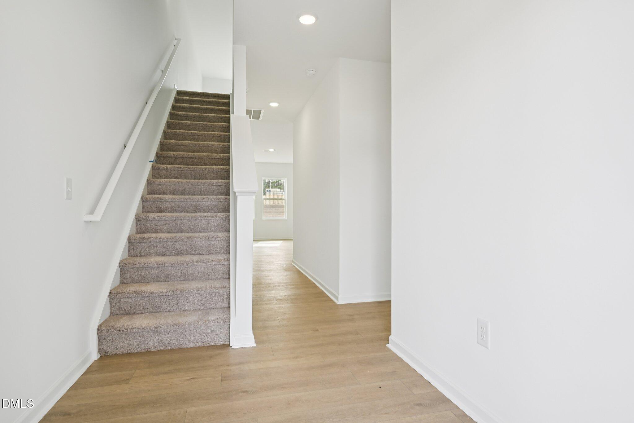 11793 Salers Loop Middlesex, NC 27557 - Photo 39 of 53 a view of an entryway with staircase