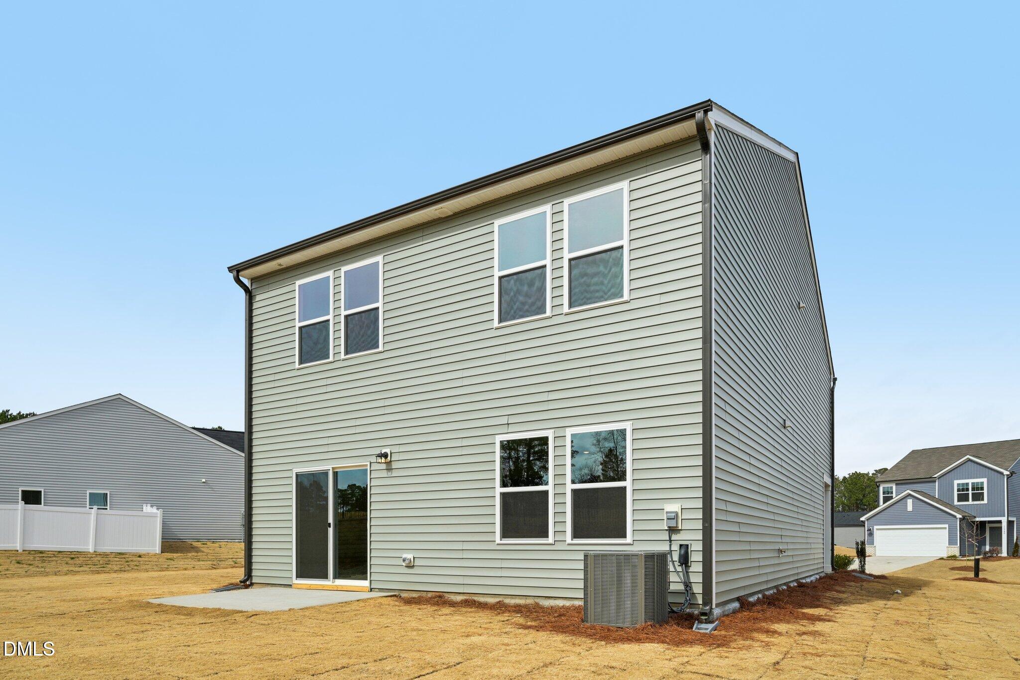 11793 Salers Loop Middlesex, NC 27557 - Photo 42 of 53 a view of a house with a yard