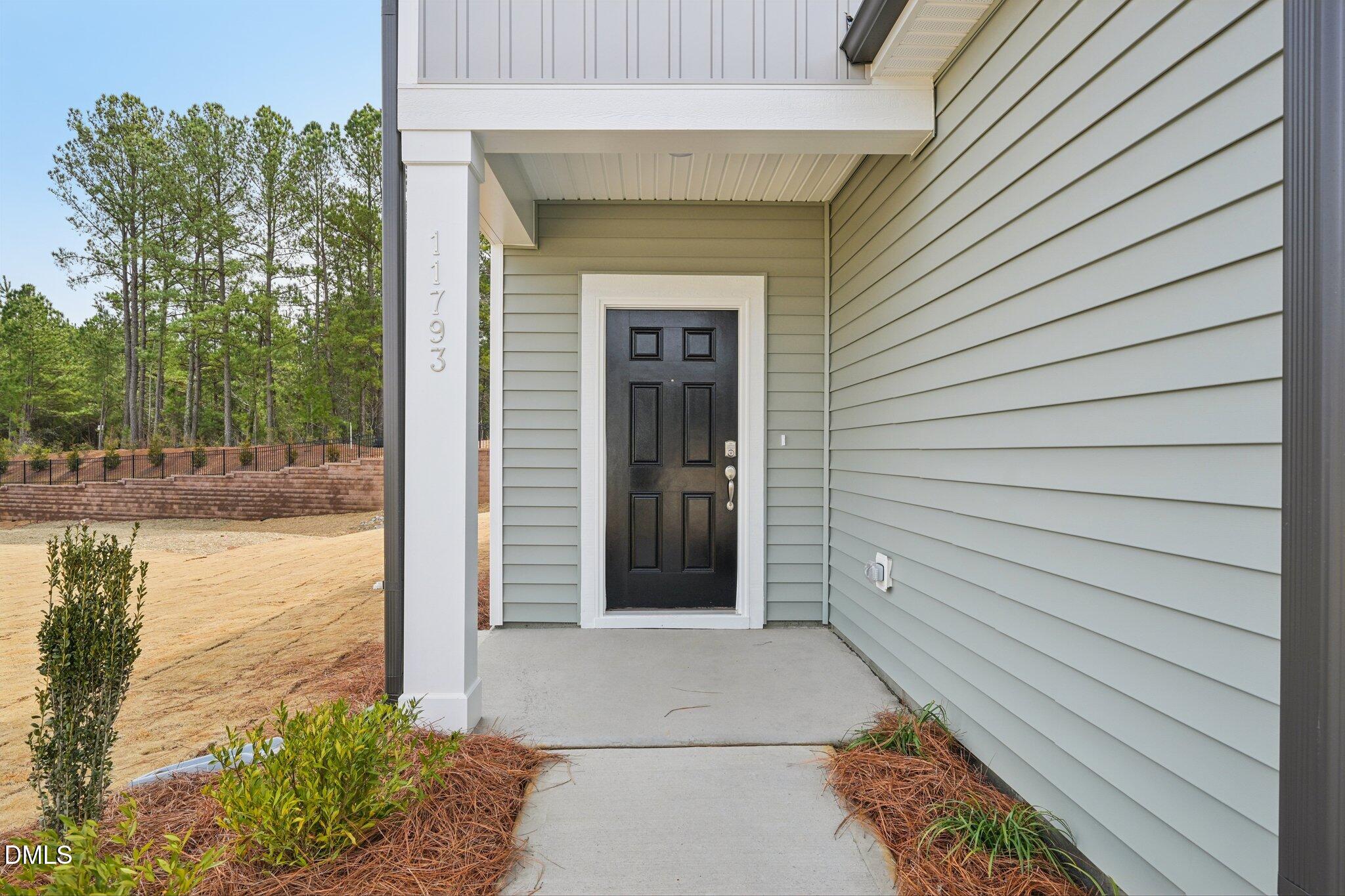 11793 Salers Loop Middlesex, NC 27557 - Photo 5 of 53 a view of front door of house