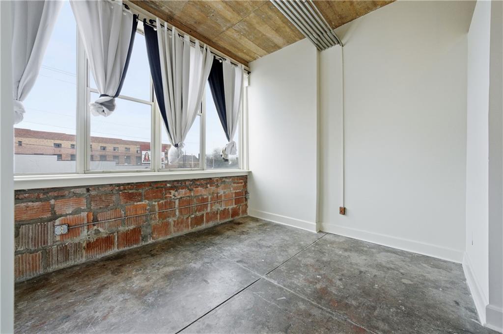 505 Whitehall Street Southwest, Unit 204 Atlanta, GA 30303 - Photo 17 of 33 a utility room with cabinets
