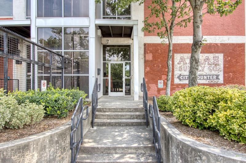 505 Whitehall Street Southwest, Unit 204 Atlanta, GA 30303 - Photo 24 of 33 a front view of a building with a garden