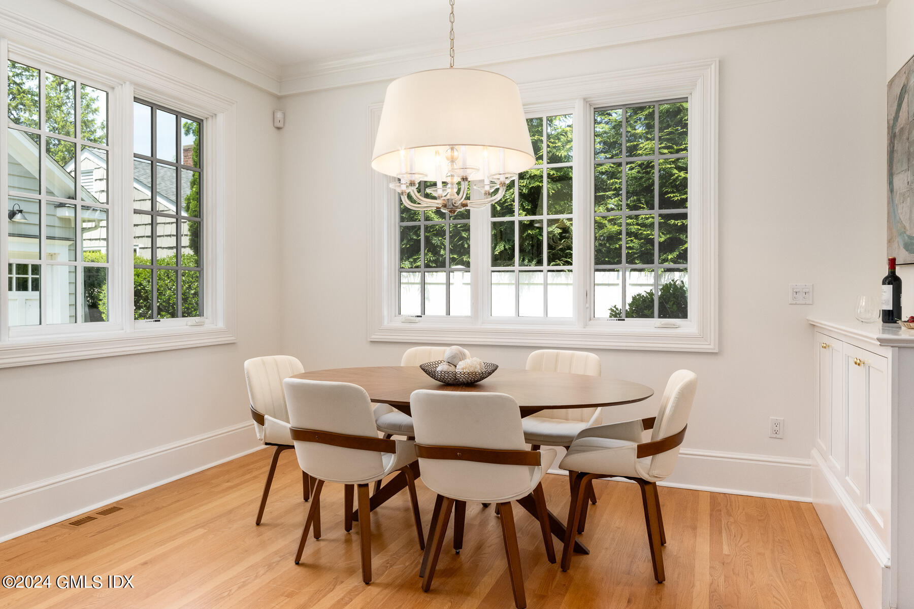 89 Shore Road Old Greenwich, CT 06870 - Photo 13 of 36 a dining room with furniture and windows