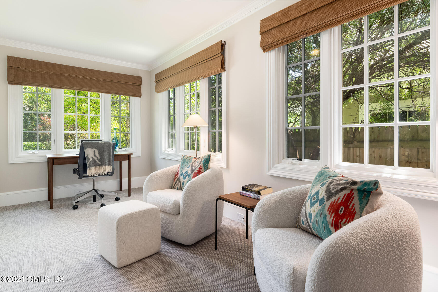 89 Shore Road Old Greenwich, CT 06870 - Photo 16 of 36 a living room with furniture and a large window