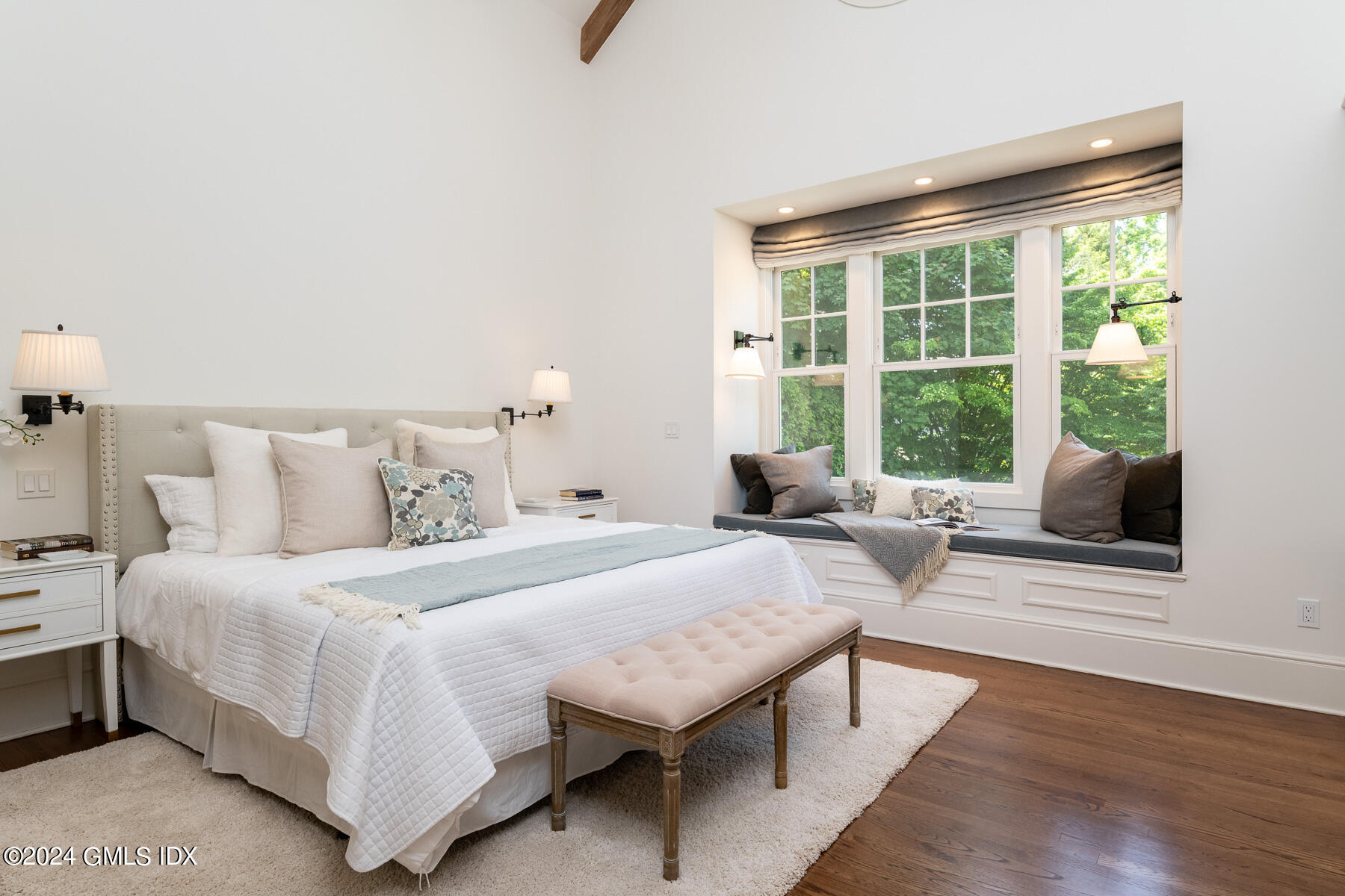 89 Shore Road Old Greenwich, CT 06870 - Photo 18 of 36 a bedroom with bed and a large window