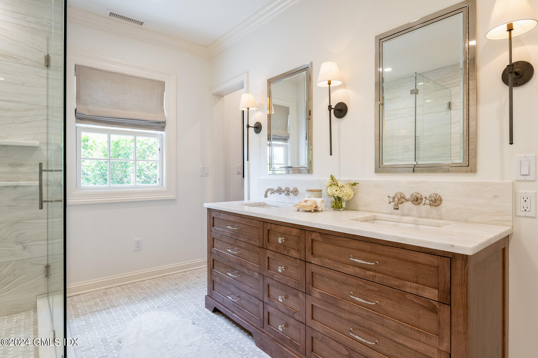 89 Shore Road Old Greenwich, CT 06870 - Photo 20 of 36 a bathroom with a sink a vanity and a mirror