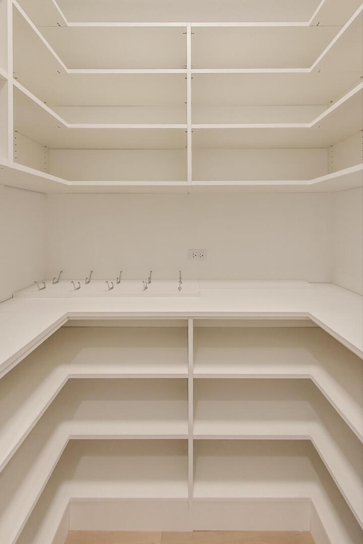 2213 West Huron Street Chicago, IL 60612 - Photo 17 of 42 a view of a room with shelves