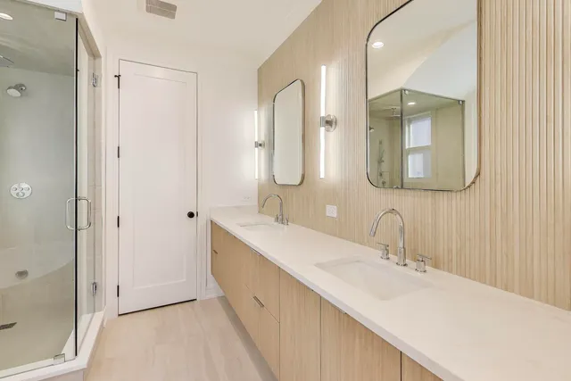 a bathroom with a bathtub and a window