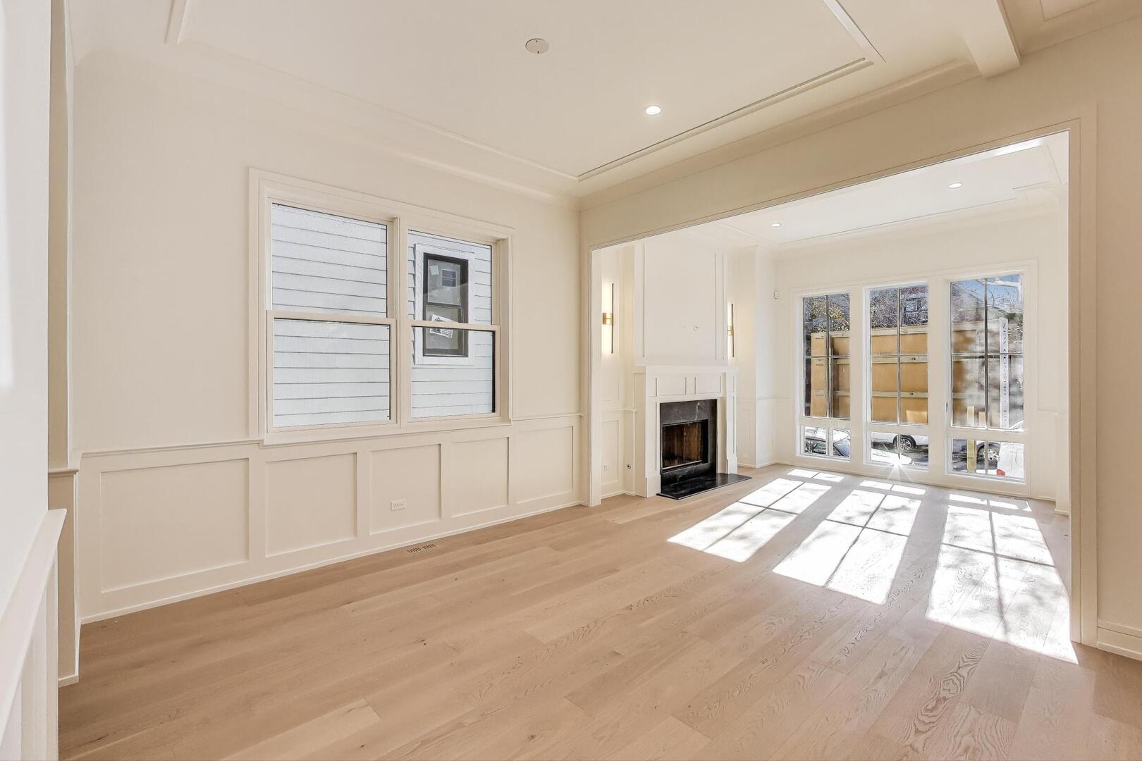 2213 West Huron Street Chicago, IL 60612 - Photo 6 of 42 a view of a livingroom with a fireplace